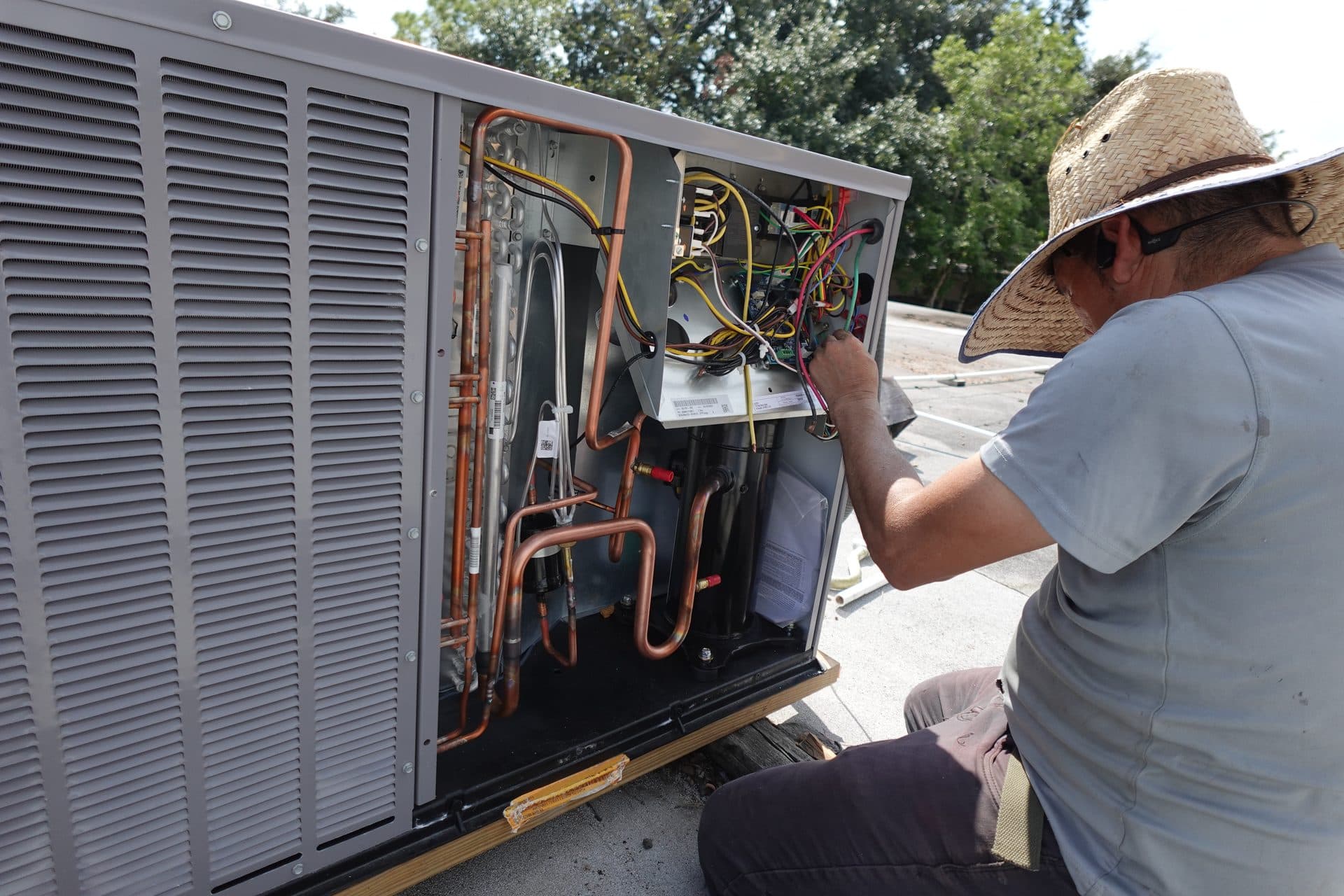 Technician inspecting furnace internals